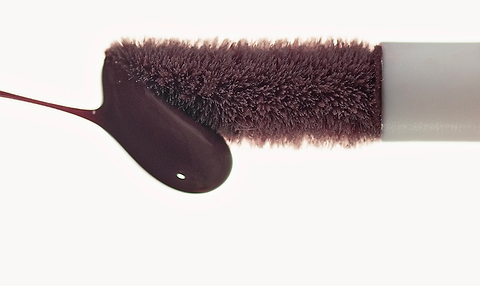 Correcteur de teint violet.