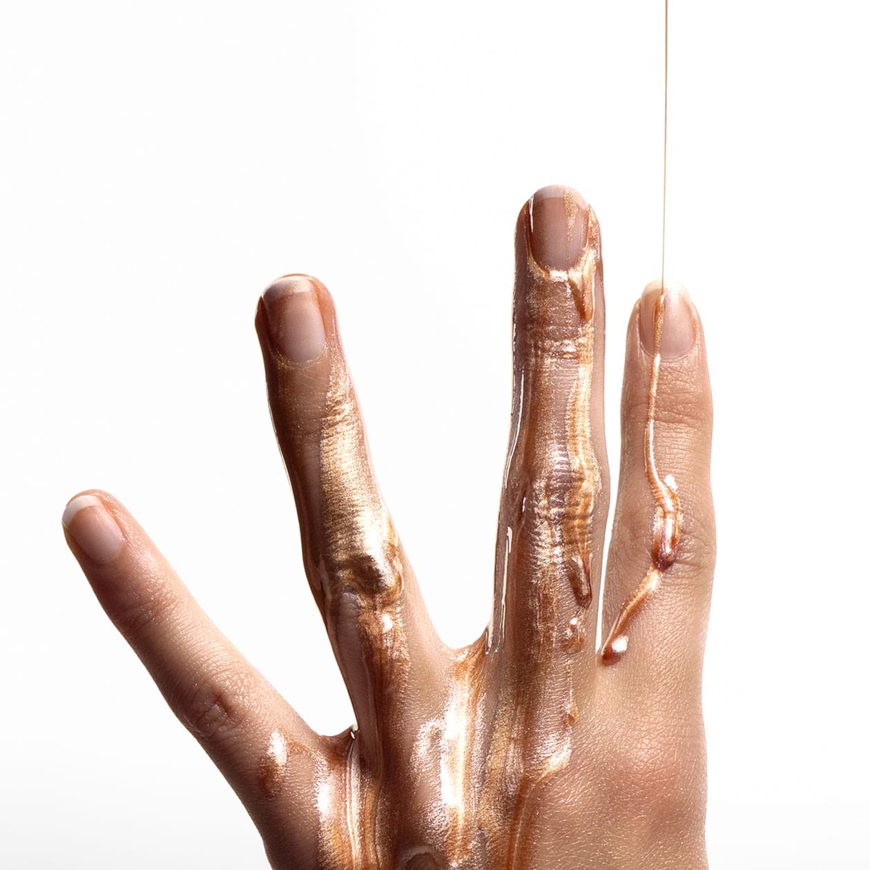 Huile pailletée pour sublimer bronzage.