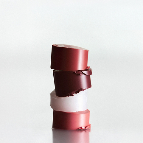 Composition baumes à lèvres teintés.
