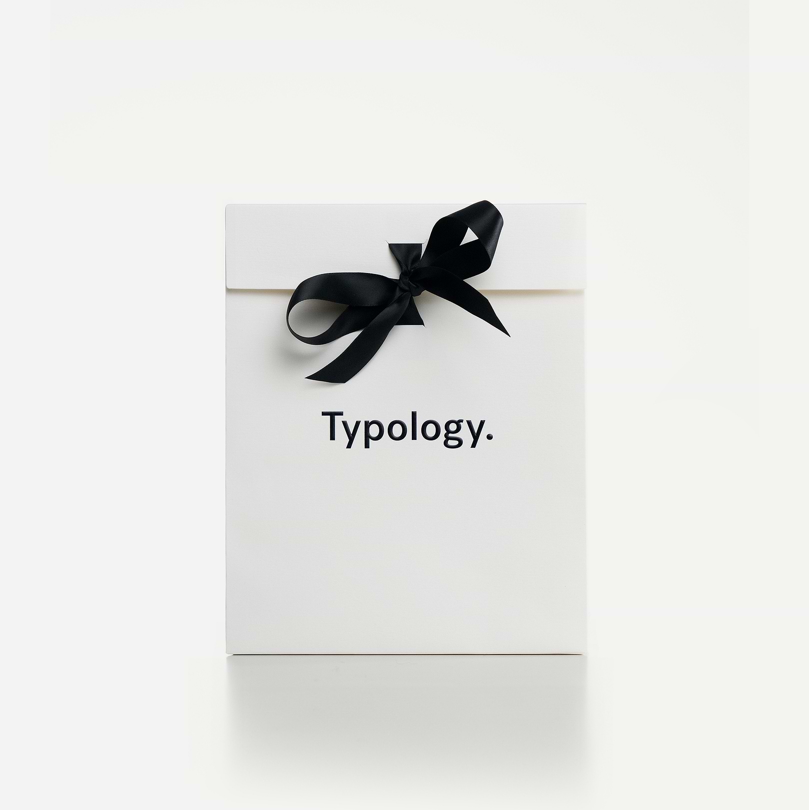 Pochette cadeau avec son ruban satiné — Typology