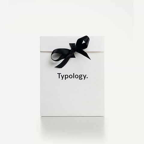 Pochette cadeau avec son ruban satiné — Typology