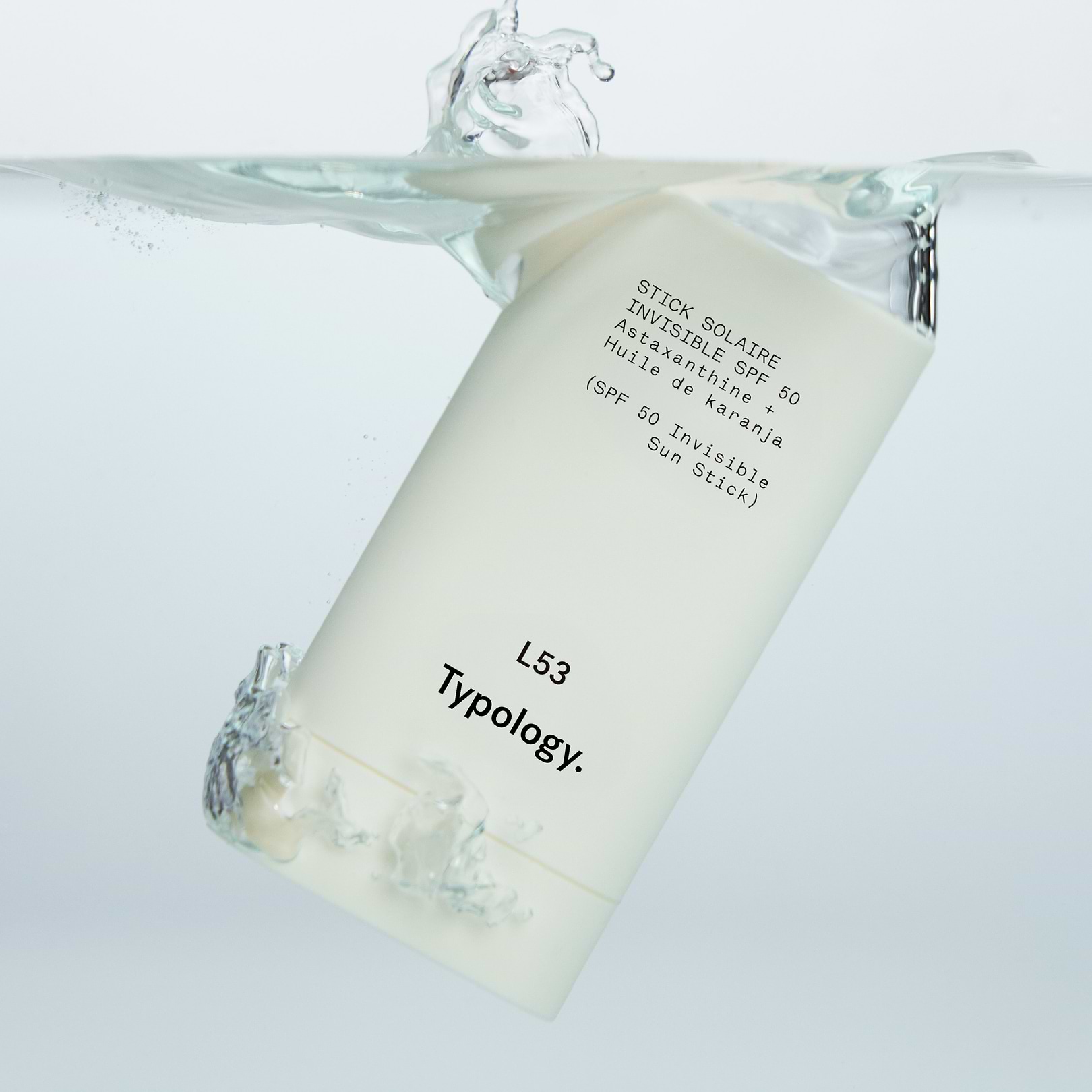 Stick Solaire Invisible SPF 50 Astaxanthine + Huile de karanja — Typology