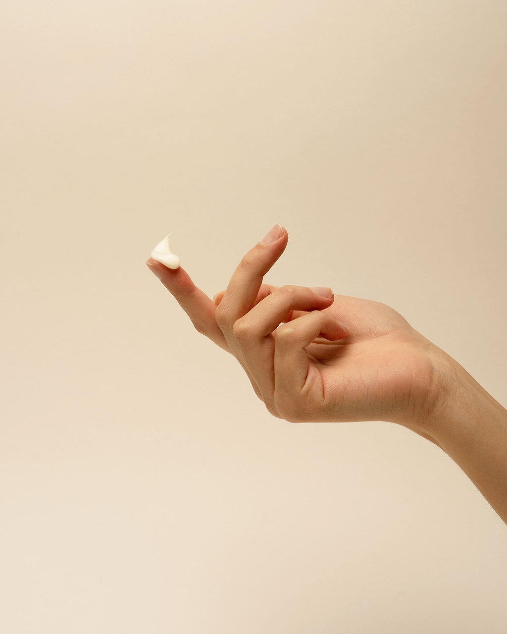 Quantité de crème visage à appliquer.