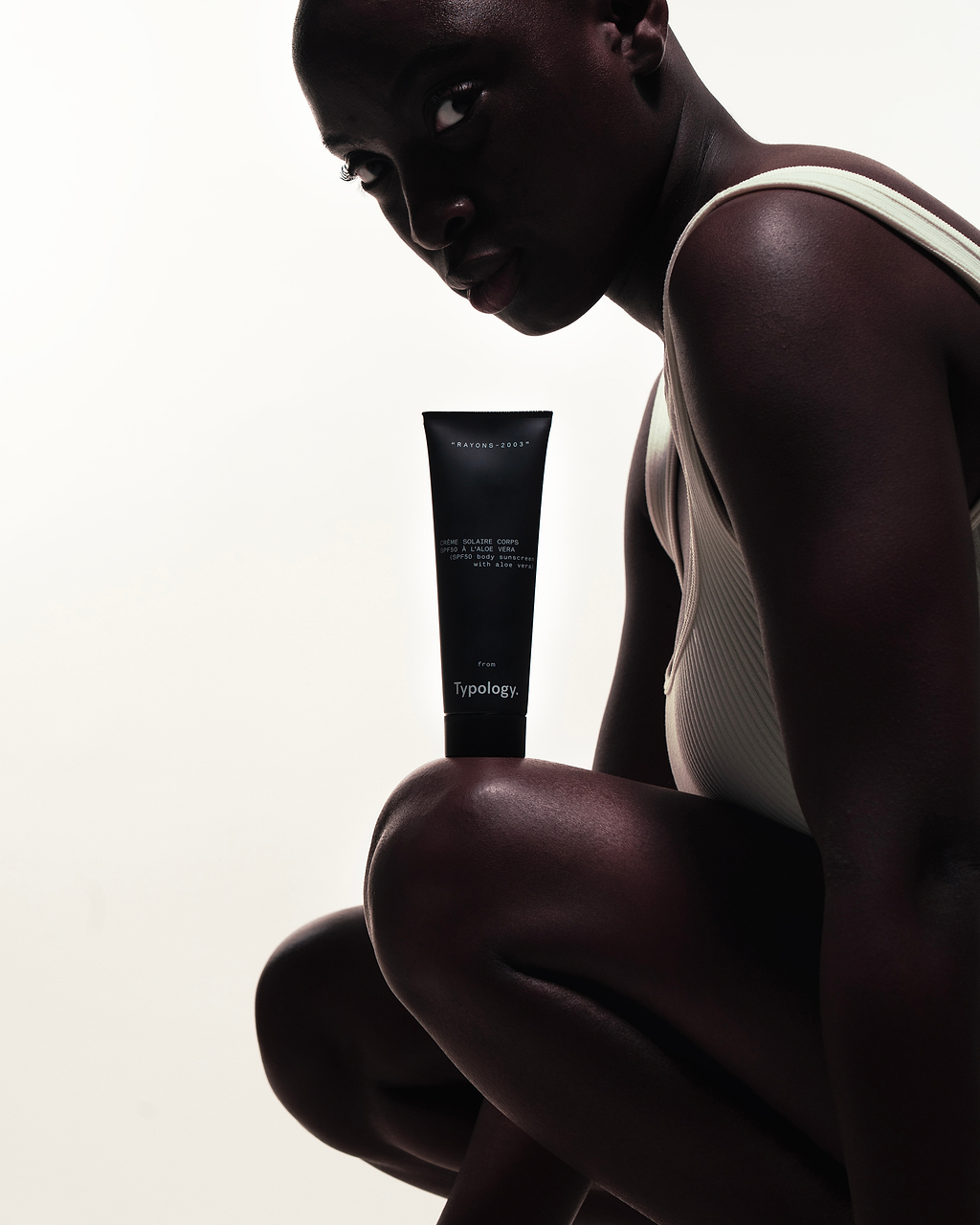 Réapplication crème solaire.