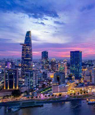 Solopgang over skyline i Ho Chi Minh City, Vietnam