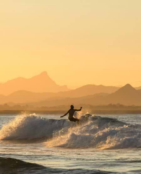Surfer ved Byron Bay, Australien
