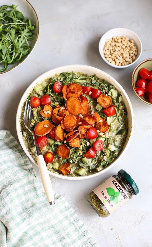 Vegan salad, green pesto and sweet potato chipsimage