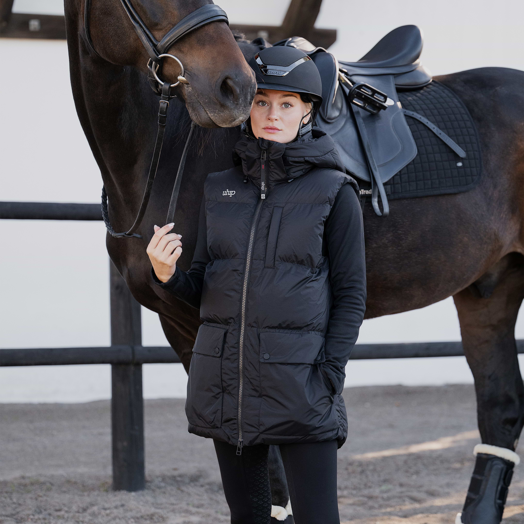 Equestrian puffer vest with back vents