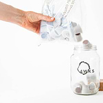 compostable packaging pouring pods into a jar
