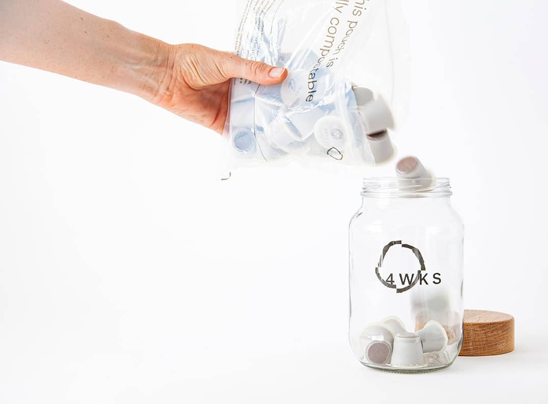 compostable packaging pouring pods into a jar