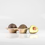 Paddy straw tray filled with avocados
