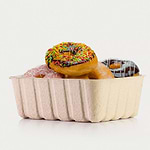 Paddy staw tray filled with donuts