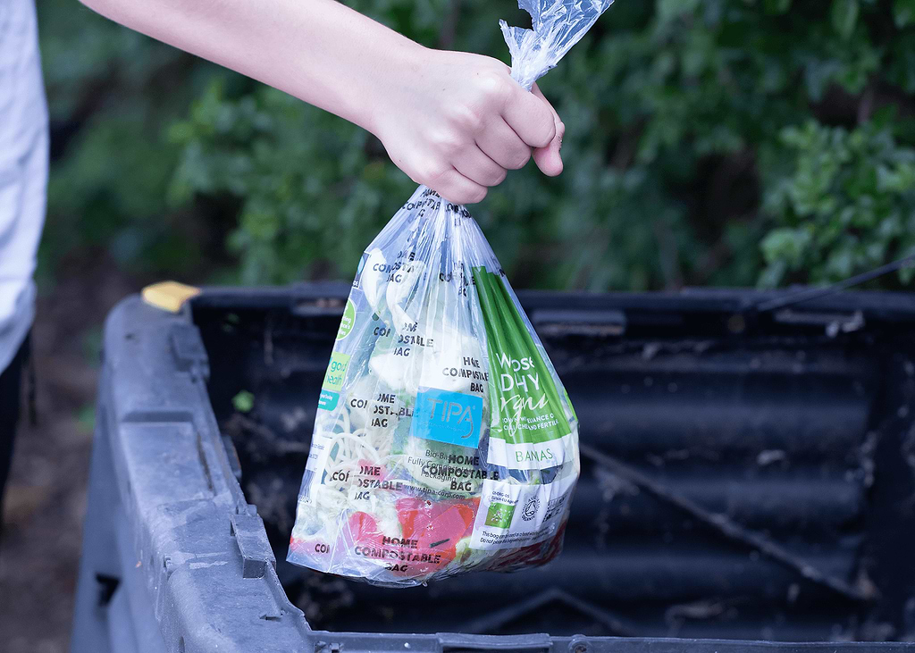 lose-up of a Waitrose organic waste home composter, showcasing its wide design