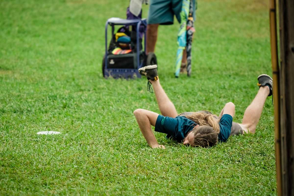 James Conrad lays on ground after missing jump putt on hole seven at USDGC