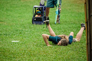 James Conrad lays on ground after missing jump putt on hole seven at USDGC