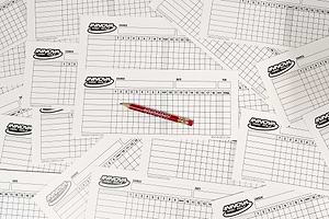Pile of Paper Scorecards