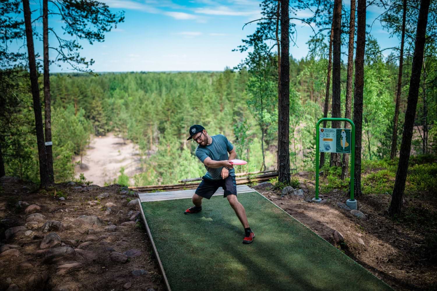 There are many disc golf throws including the backhand throw demonstrated here.