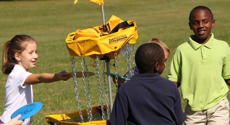 Each year at the USDGC, area shcool children get to experience disc golf, many for the first time.