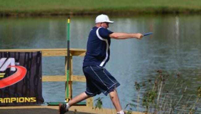 Disc Golfer by Water