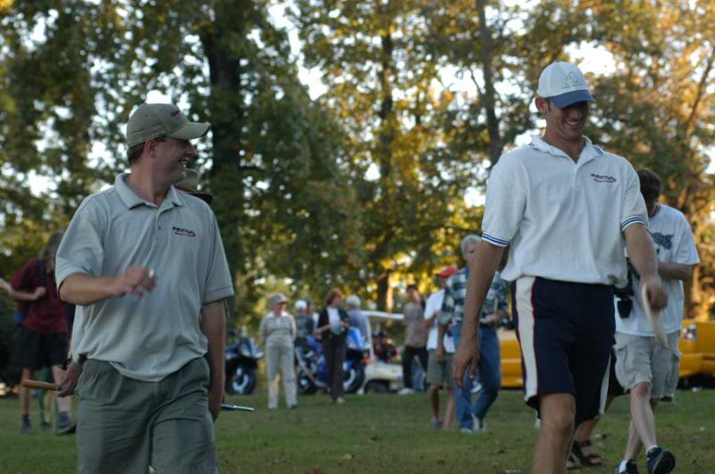Disc Golfers walking towards goal