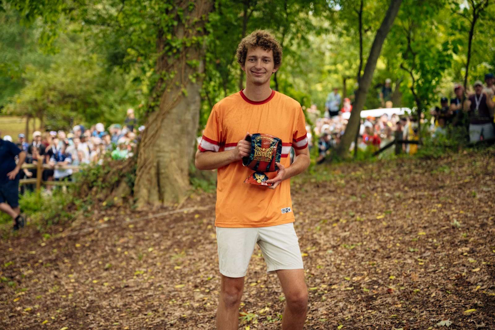 Calvin Heimburg holds his trophy after winning the 2026 United States Disc Golf Championship at Winthrop.