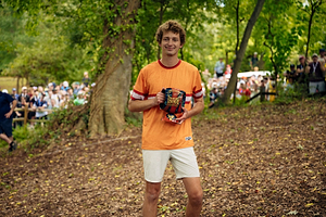 Calvin Heimburg holds his trophy after winning the 2026 United States Disc Golf Championship at Winthrop.