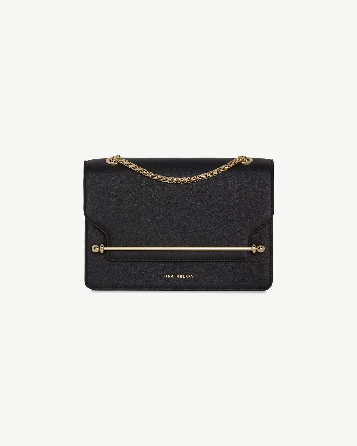 Black Strathberry east-west bag with gold chain strap and bar detail.