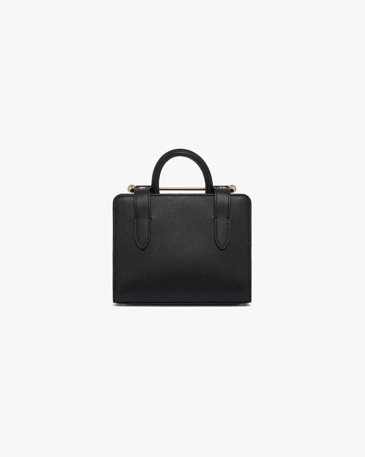 Black leather nano tote with top handle and gold-tone bar detail.