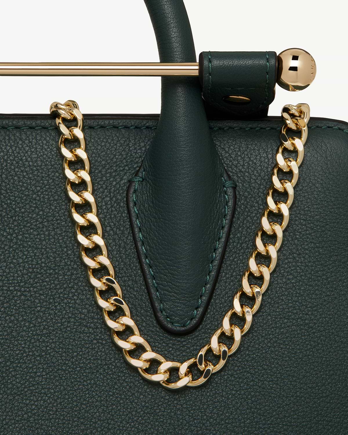 Bottle green nano tote top handle with gold curb chain strap and polished bar.