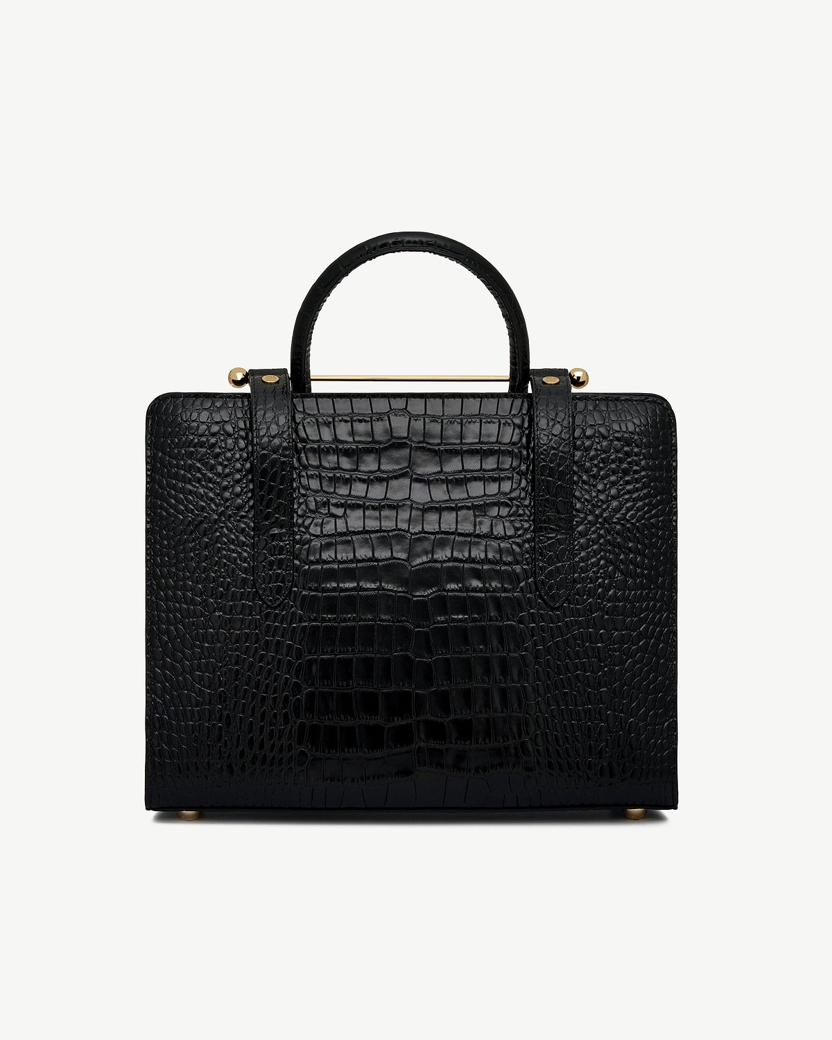 Black croc-texture midi tote with top handle and gold bar detail, front view