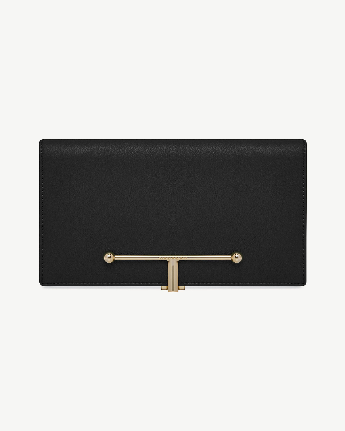 Large black leather wallet with gold horizontal bar closure centred on front