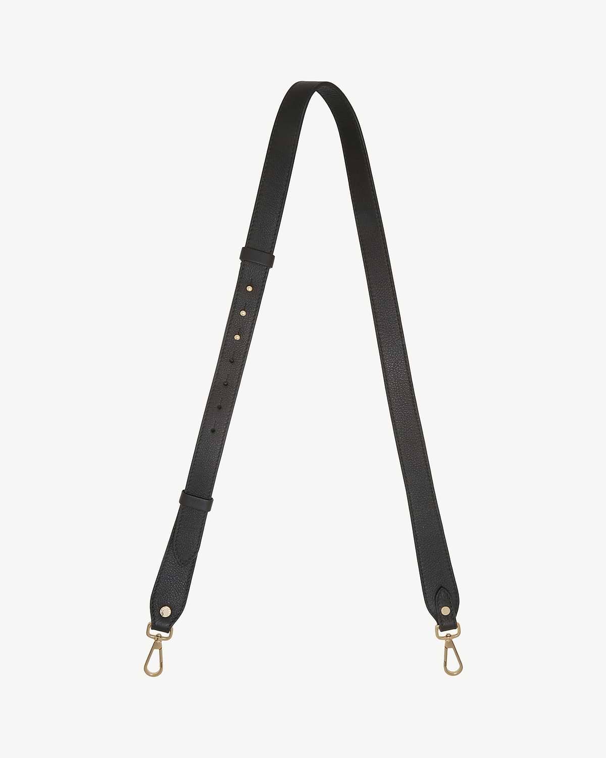 Black adjustable leather strap with gold metal clip hooks and multiple adjustment holes