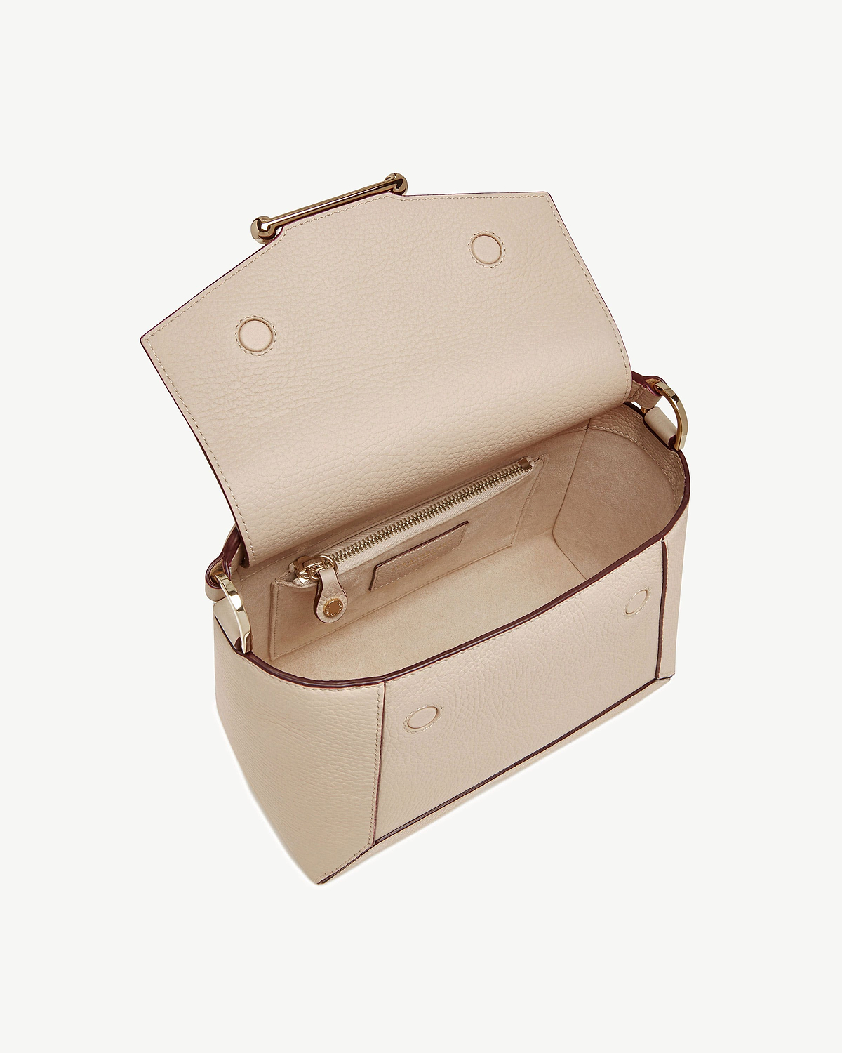 Oat leather mosaic bag with flap open showing interior zip pocket and lining.