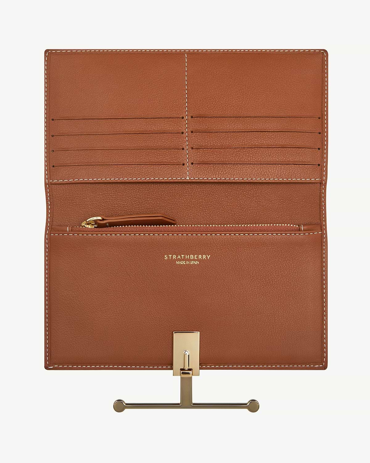 Open chestnut leather large wallet with vanilla stitching, card slots, zip pocket, Strathberry logo.