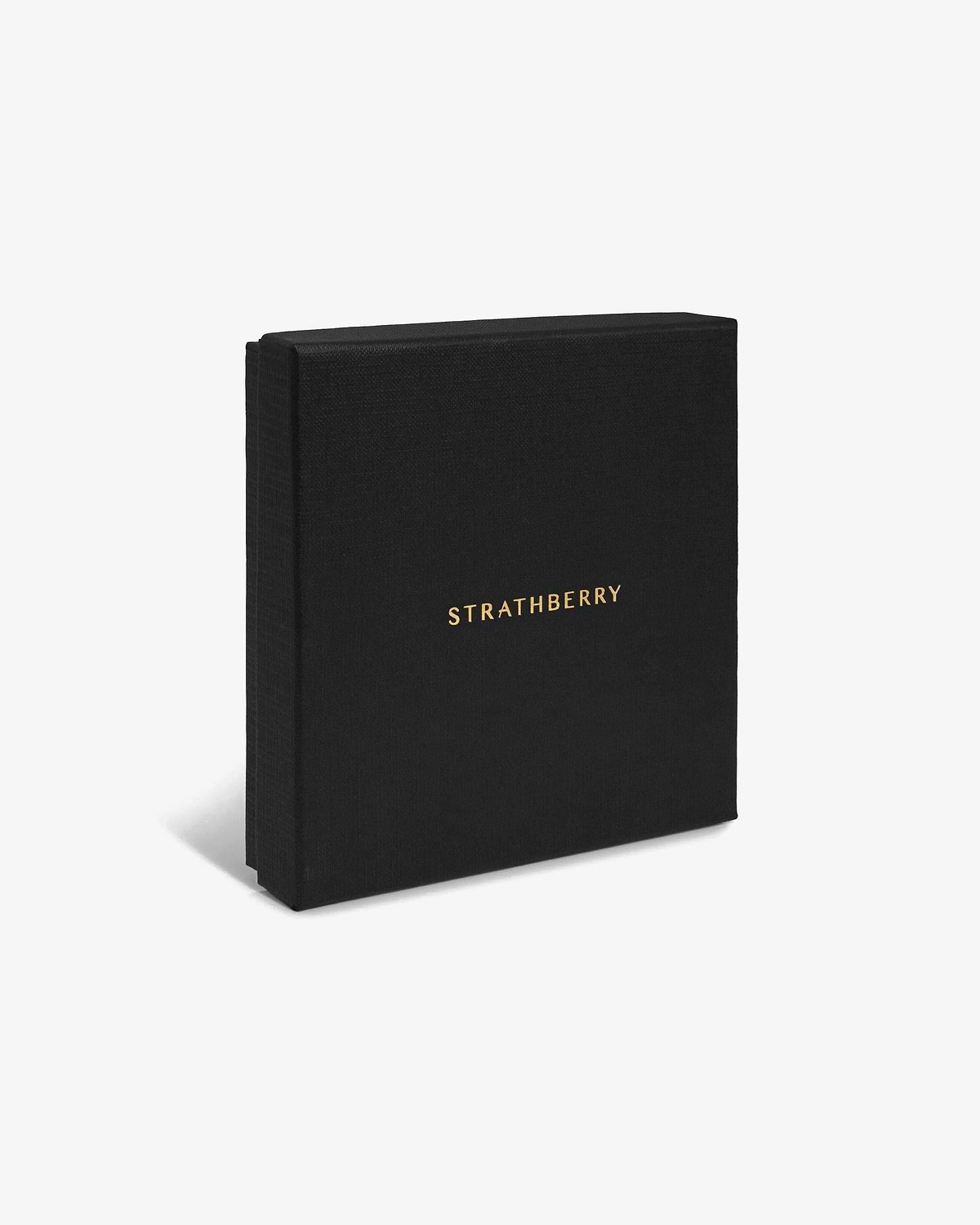 Black Strathberry box with gold logo, placed at an angle on a white background.