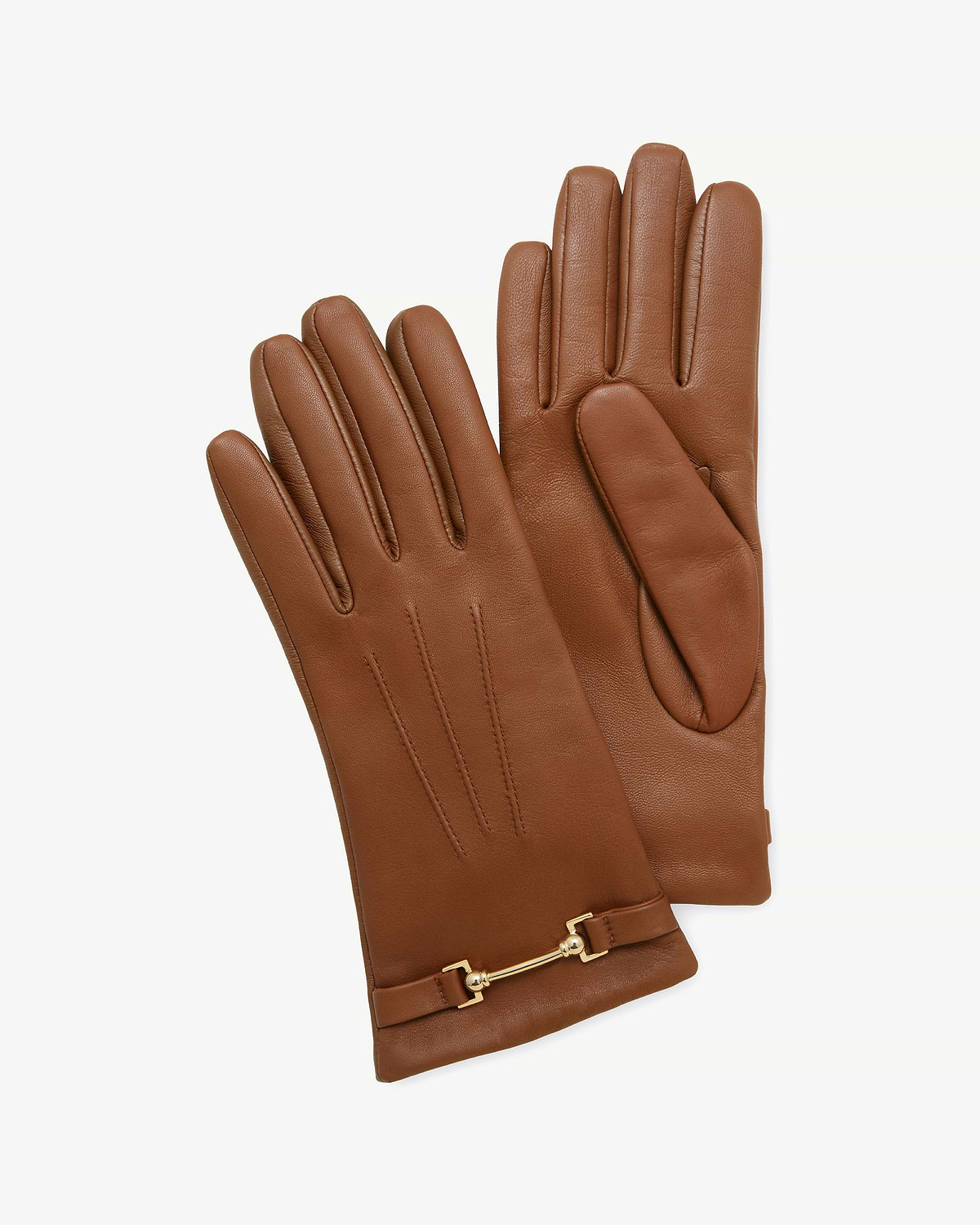 Pair of tan leather gloves with three stitched lines and gold metal bar detail.