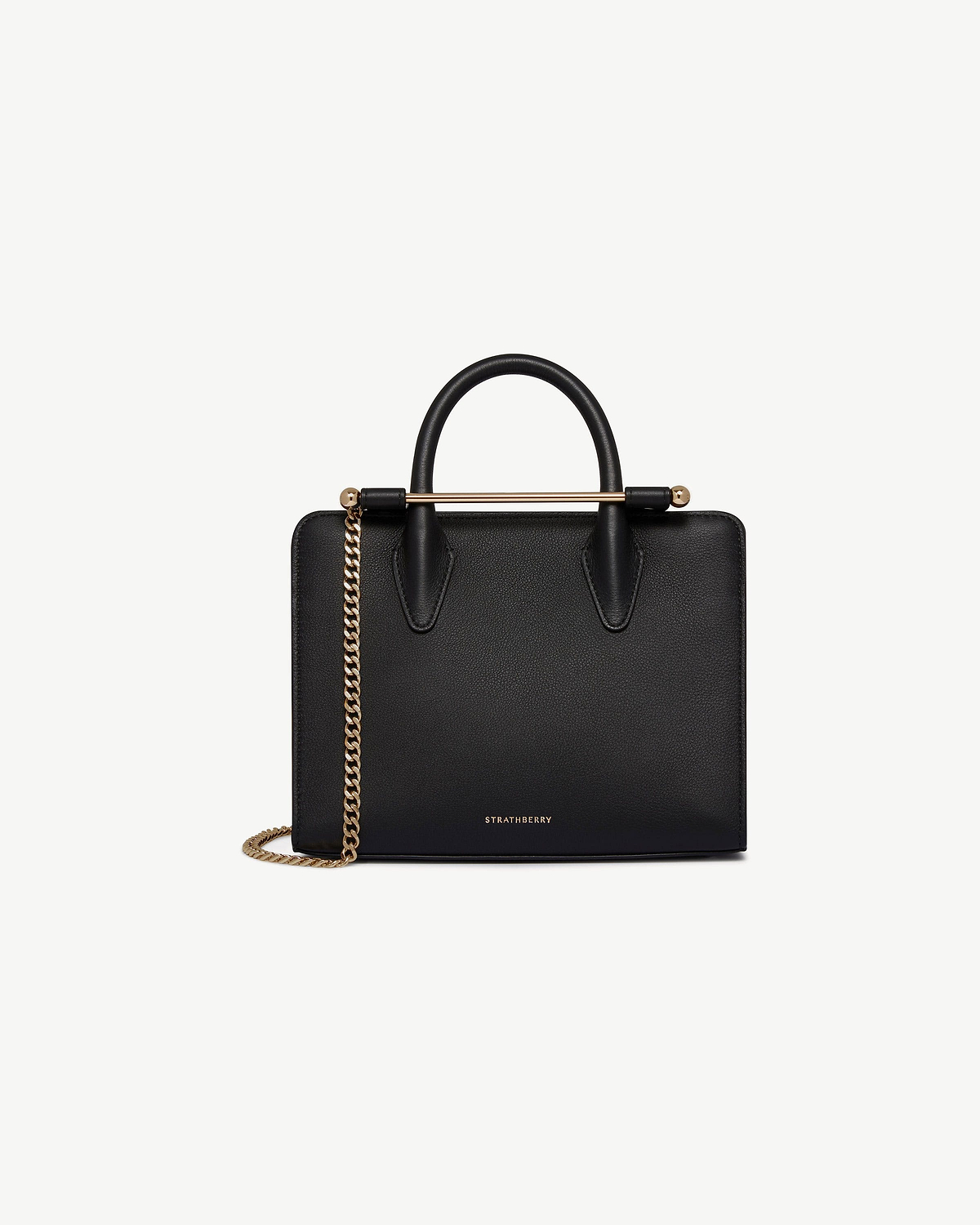Black Strathberry mini tote with top handles and gold chain shoulder strap.
