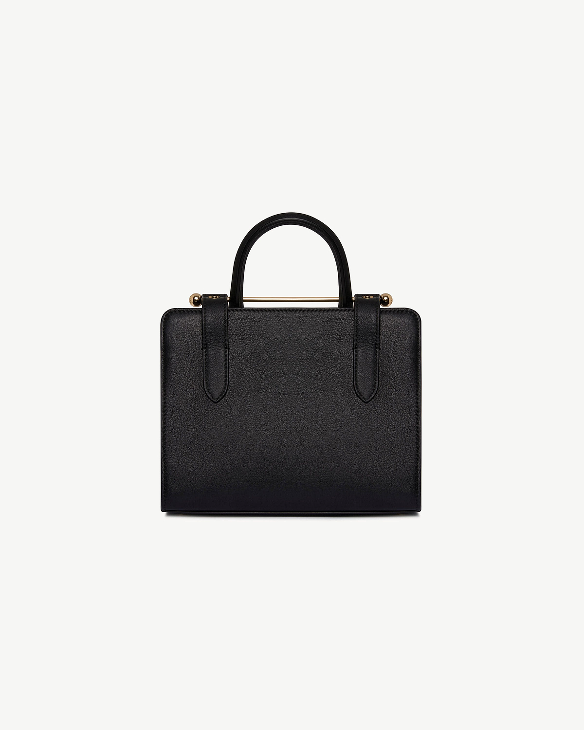 Top of black mini tote with rounded top handles and gold-tone bar hardware.