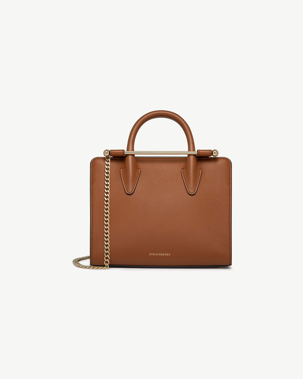 Strathberry chestnut mini tote with top handle and gold chain strap.