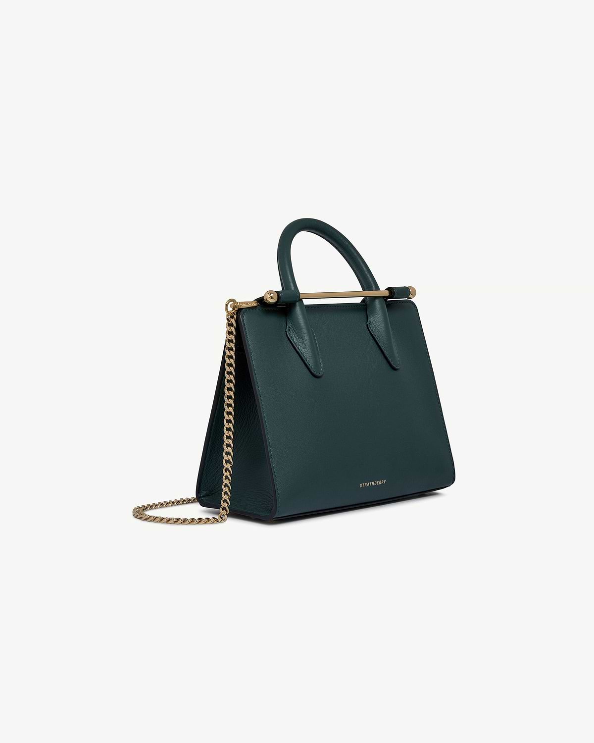 Bottle green Strathberry mini tote with top handle, gold bar and chain strap.