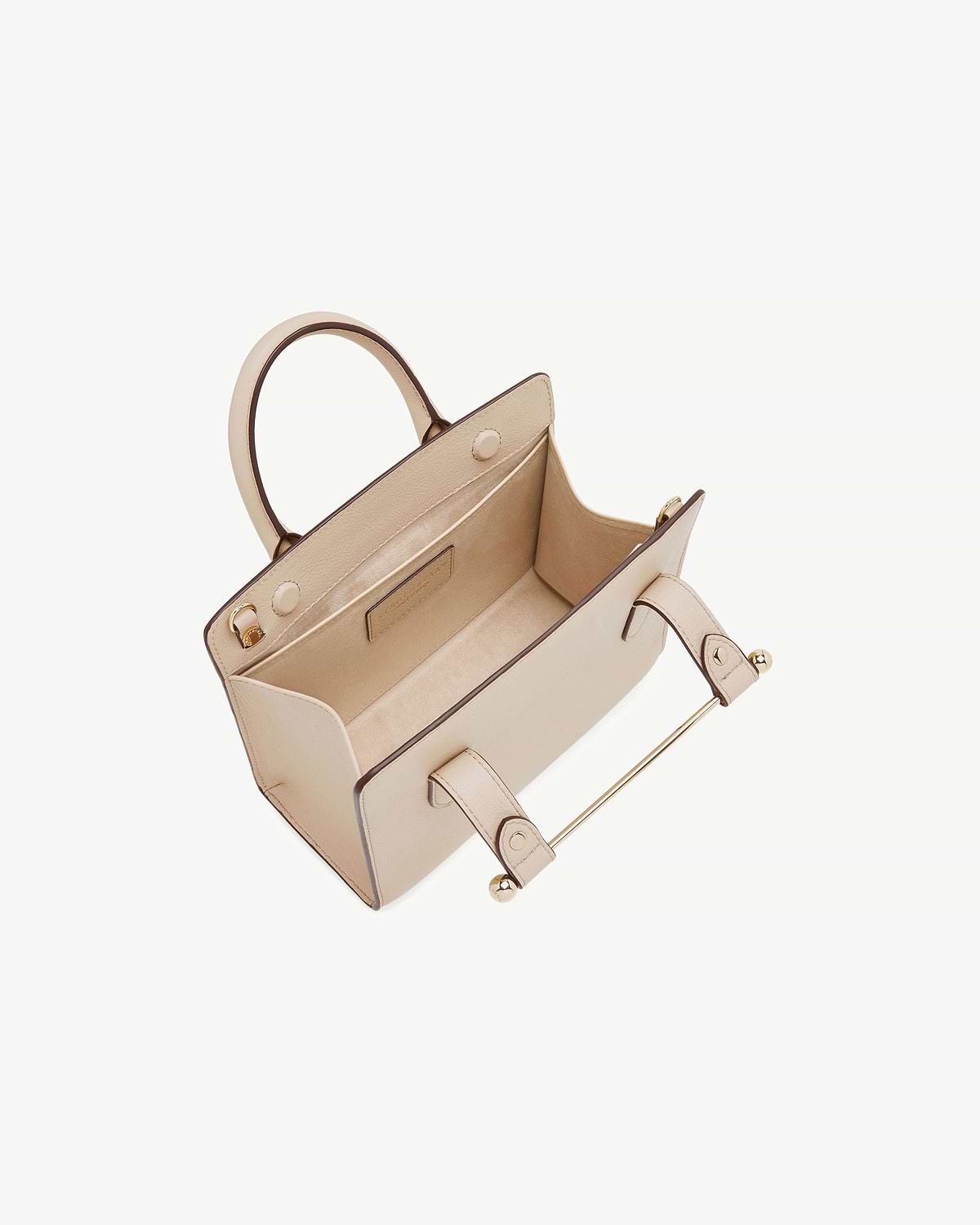 Oat mini tote with open top, visible interior pocket and gold-tone hardware.