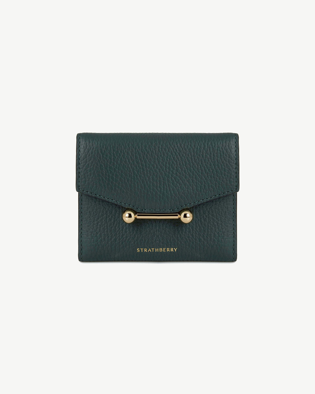 Bottle green mosaic trifold wallet with gold bar closure and Strathberry logo.