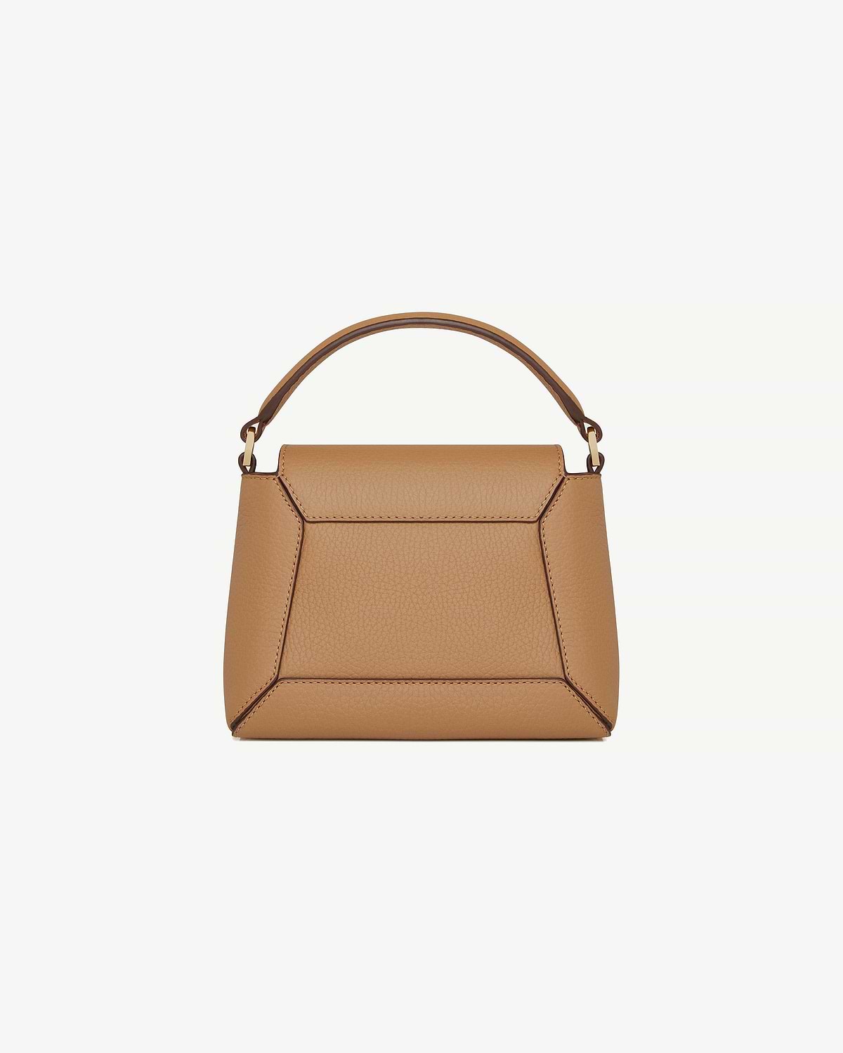 Caramel leather mini top-handle bag, front view showing handle and geometric panels