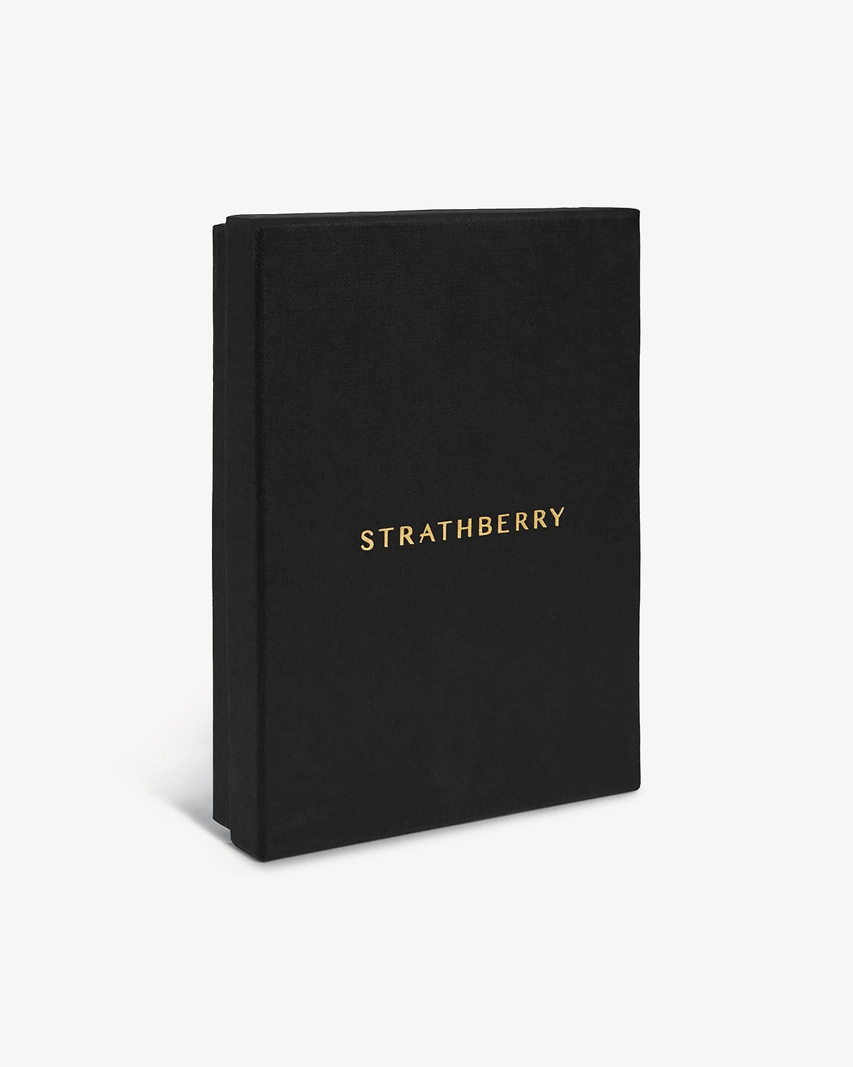 Rectangular black box standing upright with gold STRATHBERRY logo on front.