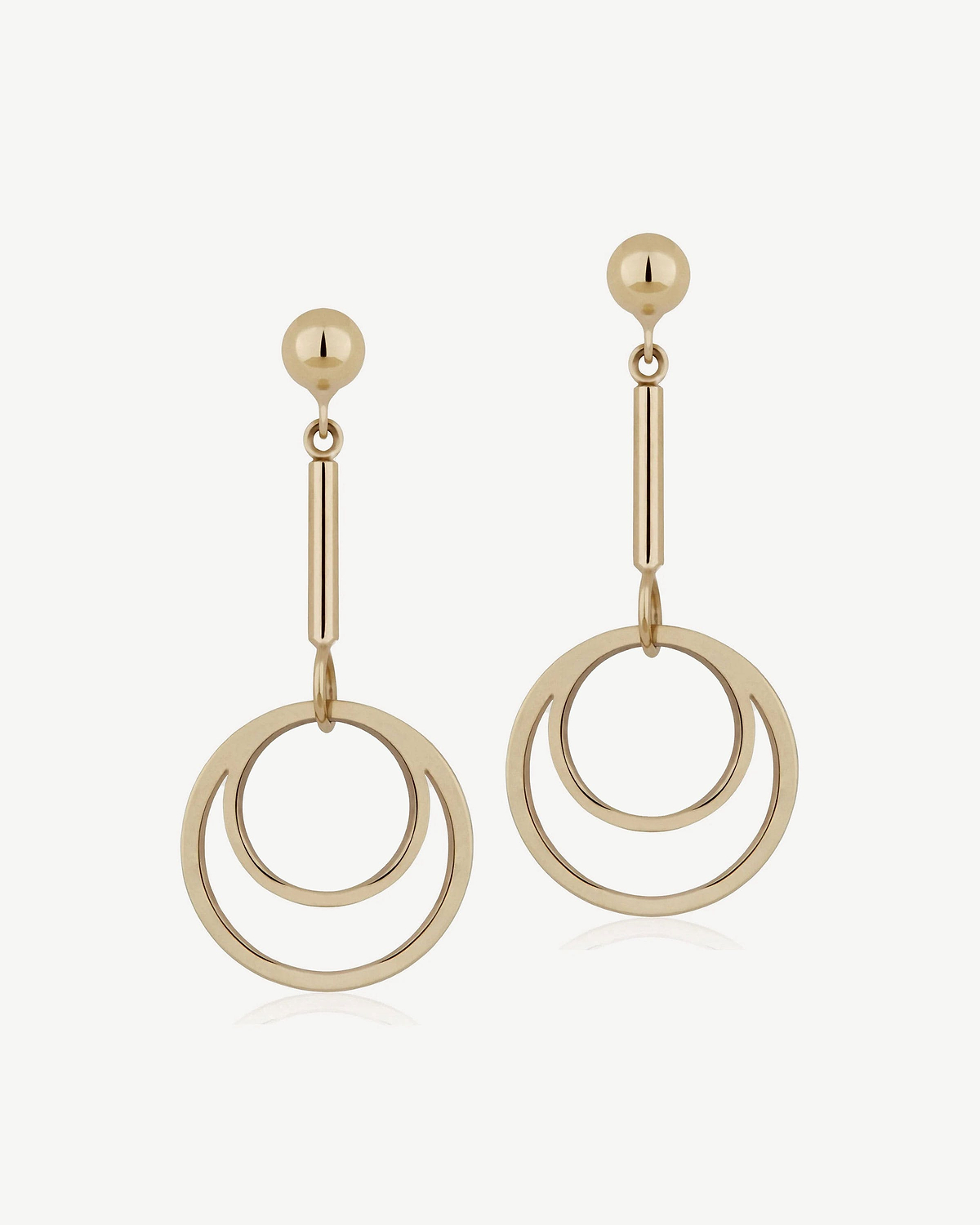 Pair of 22 carat gold-gilded circle drop earrings with two concentric rings.