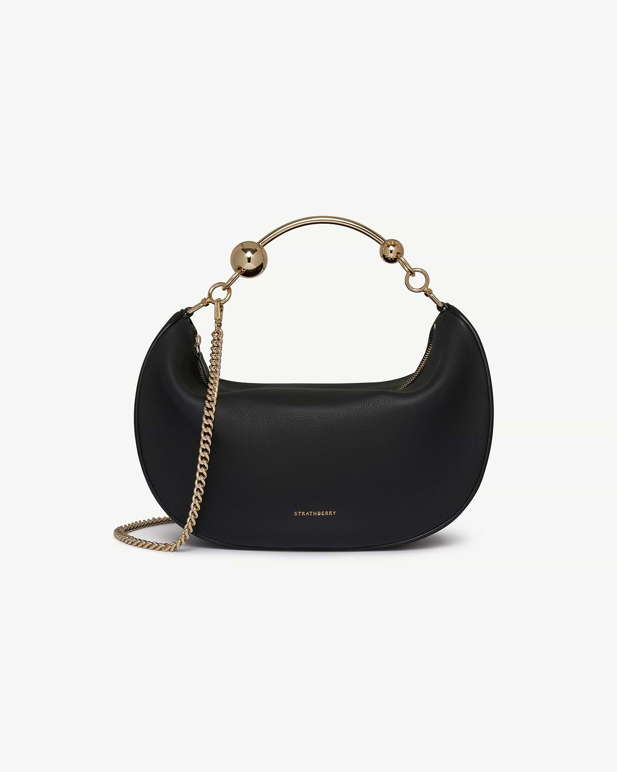 Black Strathberry Crescent Moon leather shoulder bag with gold top handle and chain.