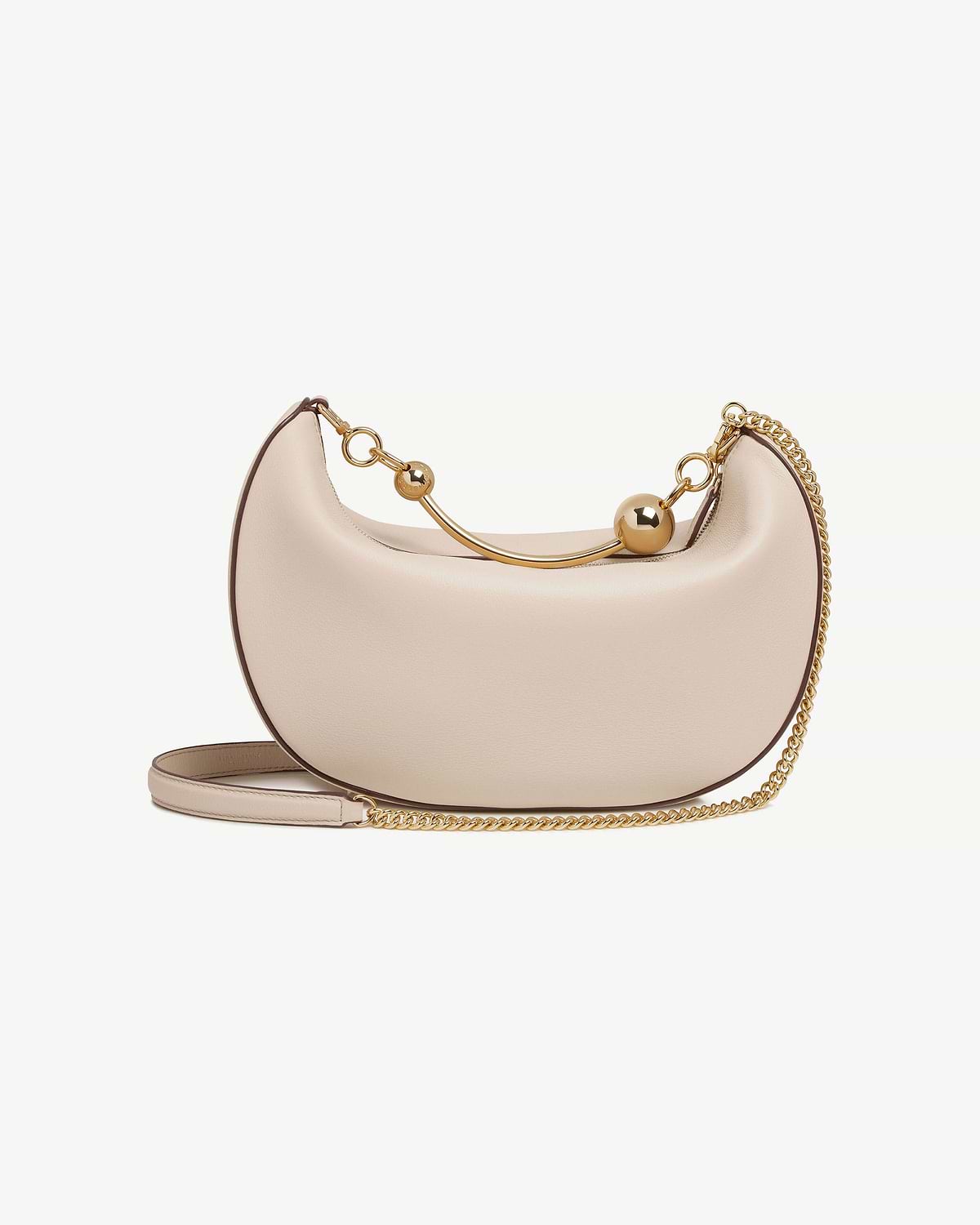 Oat crescent moon bag with gold ball bar and chain shoulder strap.