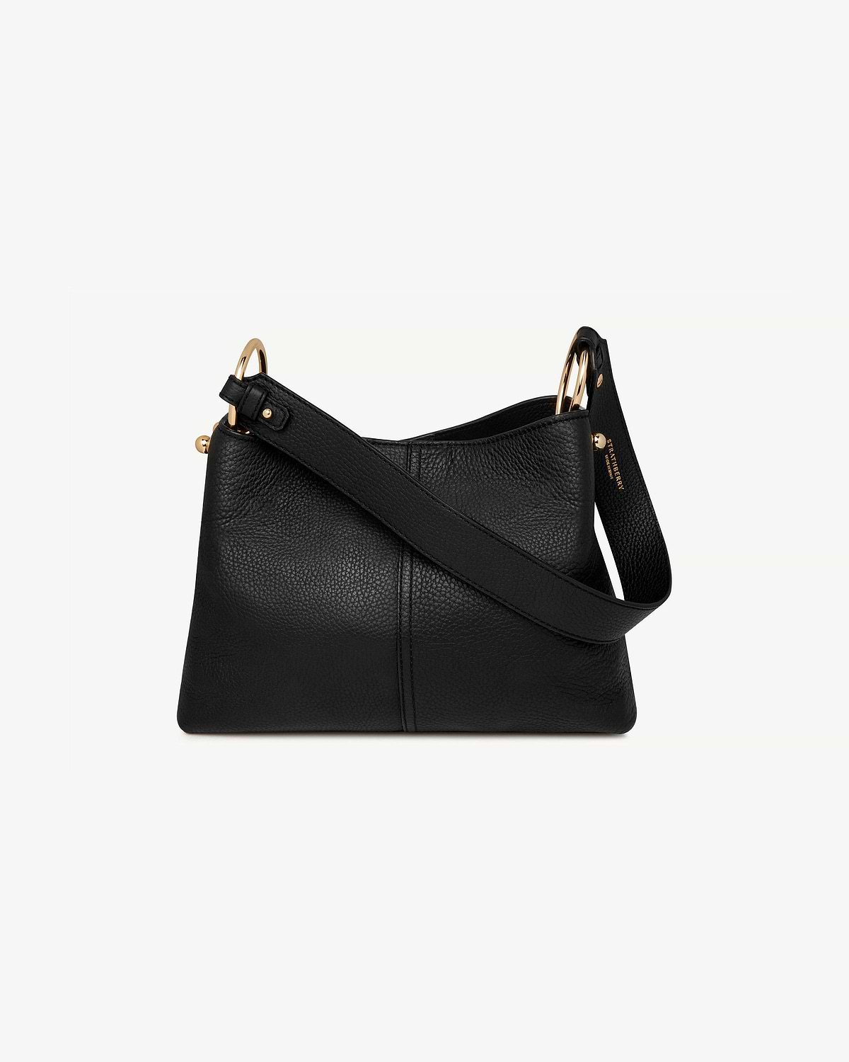 Black pebbled leather Lana hobo bag with Strathberry stamped strap and gold rings.