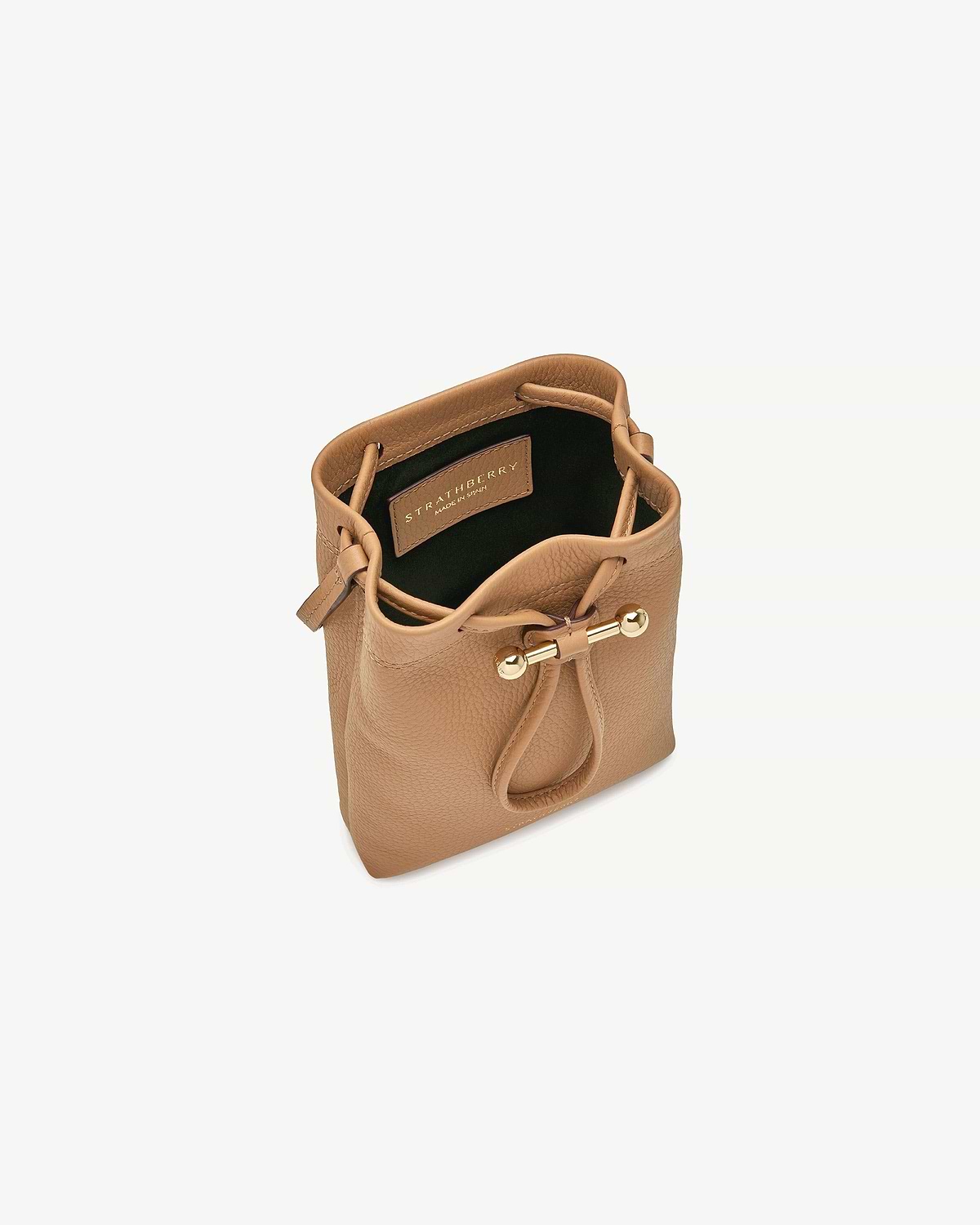 Caramel leather midi pouch by Strathberry with drawstring and gold bar hardware