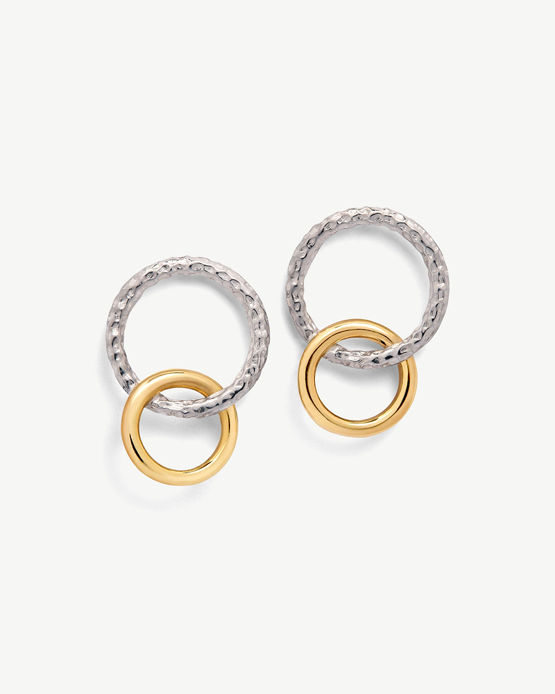 Pair of Halo earrings with hammered sterling silver hoops linked to 24-carat gold rings
